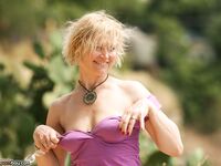 Blonde mom posing Photos
